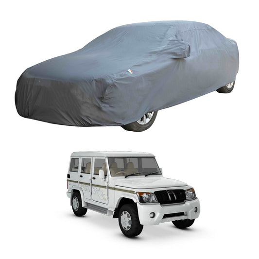 Oshotto Dark Grey 100% Anti Reflective, dustproof and Water Proof Car Body Cover with Mirror Pocket For Mahindra Bolero